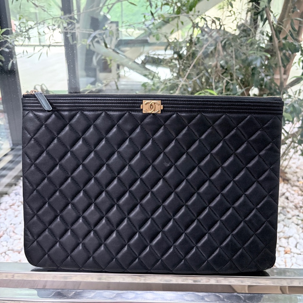 Authentic CHANEL Black Quilted Leather Zip Pouch with Gold CC Accent